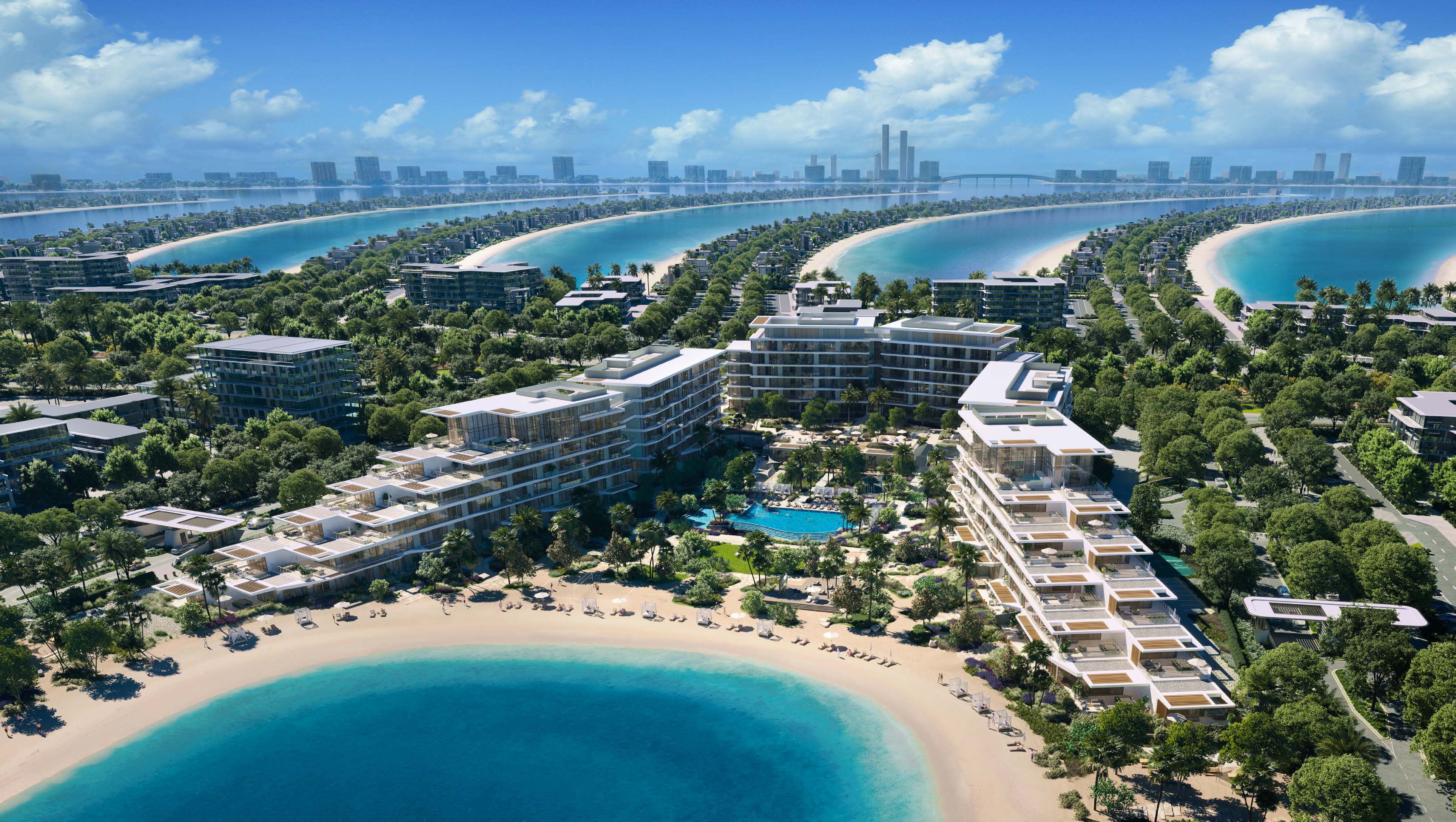Aerial of the three buildings, beach and pool among the fronds of Palm Jebel Ali