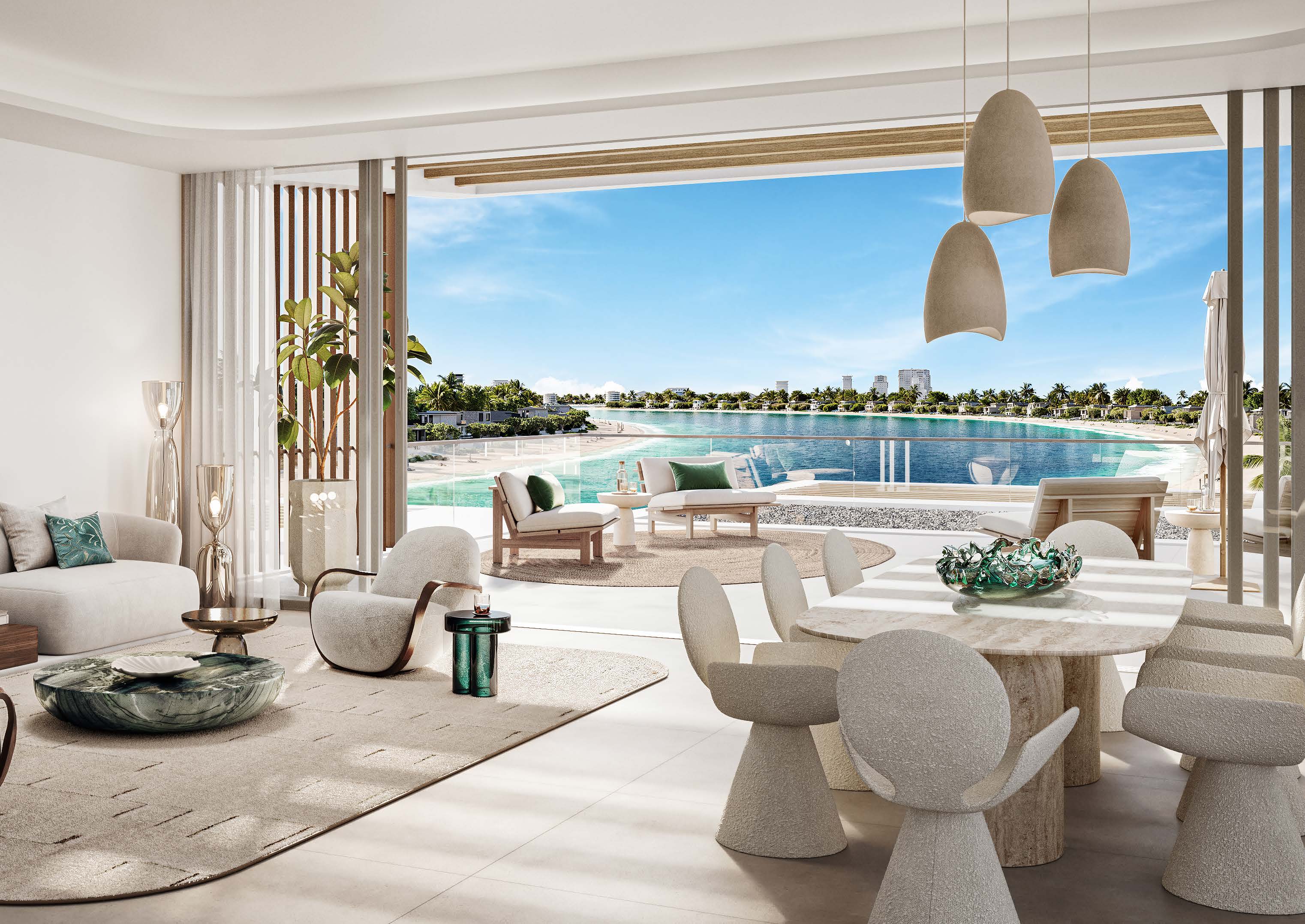 Three-bedroom living and dining room opening onto a terrace above the beach