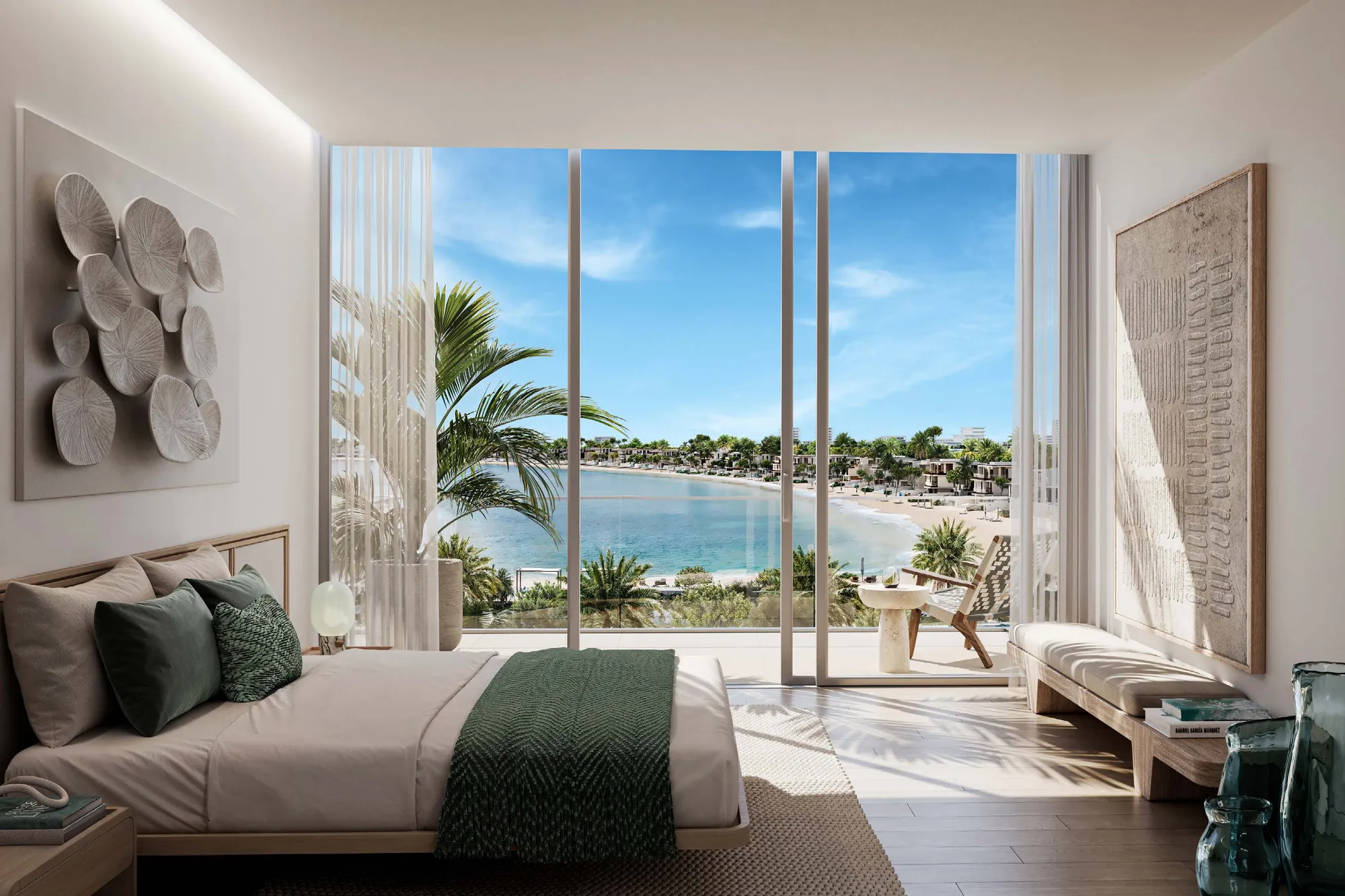 Master bedroom with full-height glass looking over palms to the beach