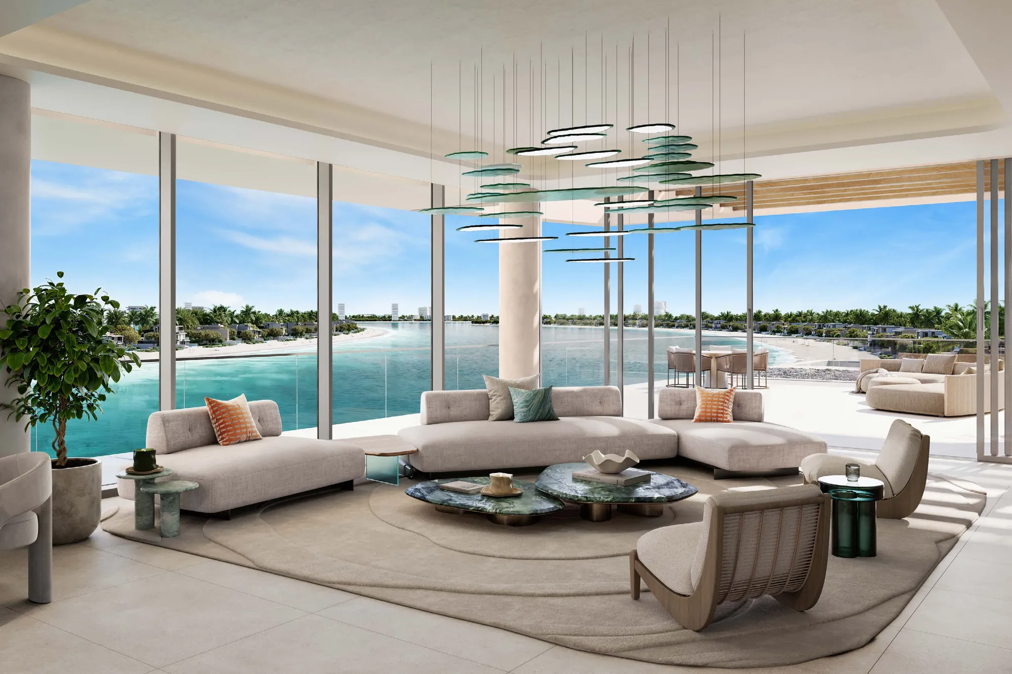 Wide four-bedroom living room wrapped in glass, with views over the bay